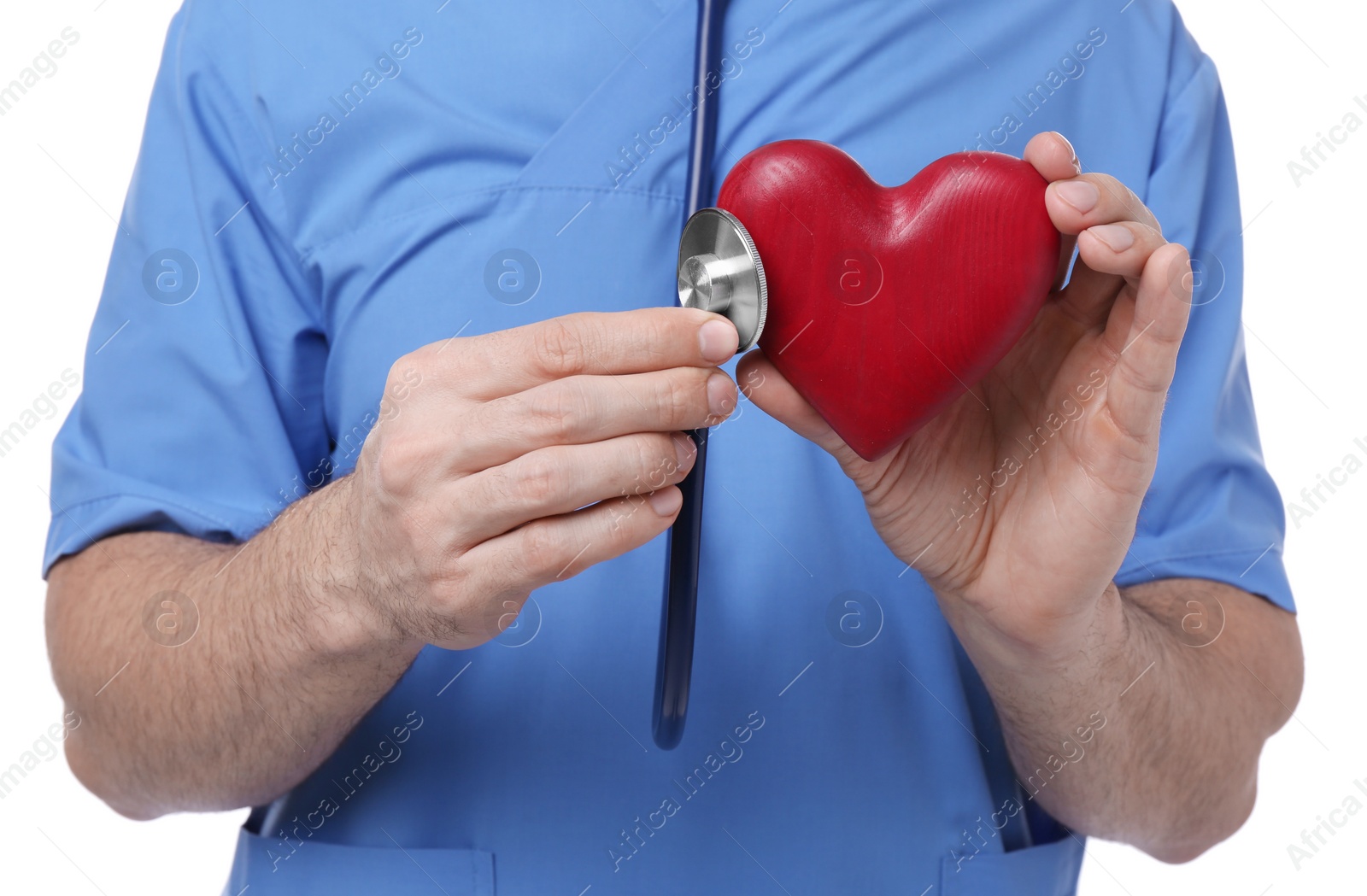 Photo of Doctor with stethoscope and red heart on white background, closeup. Cardiology concept