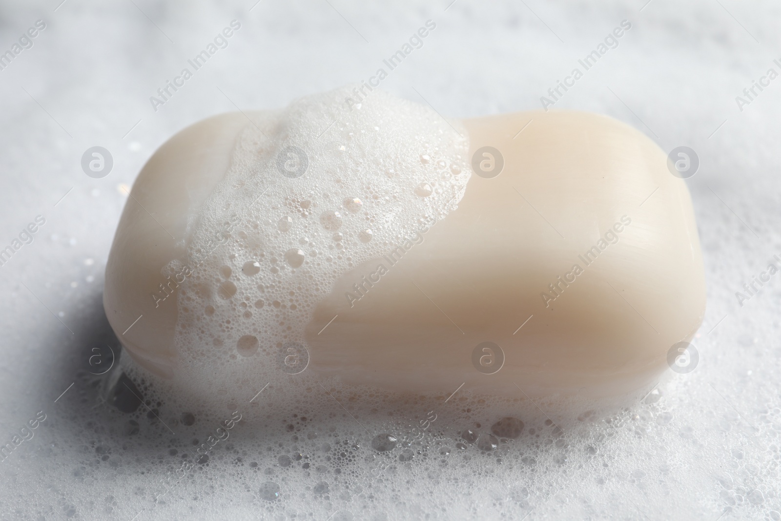 Photo of Closeup view of soap and fluffy foam