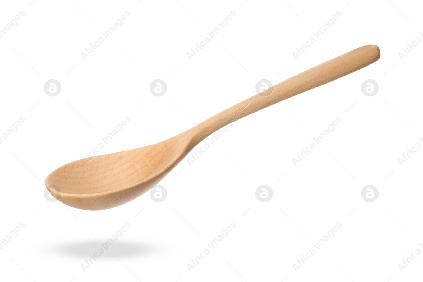 Image of Wooden spoon in air isolated on white