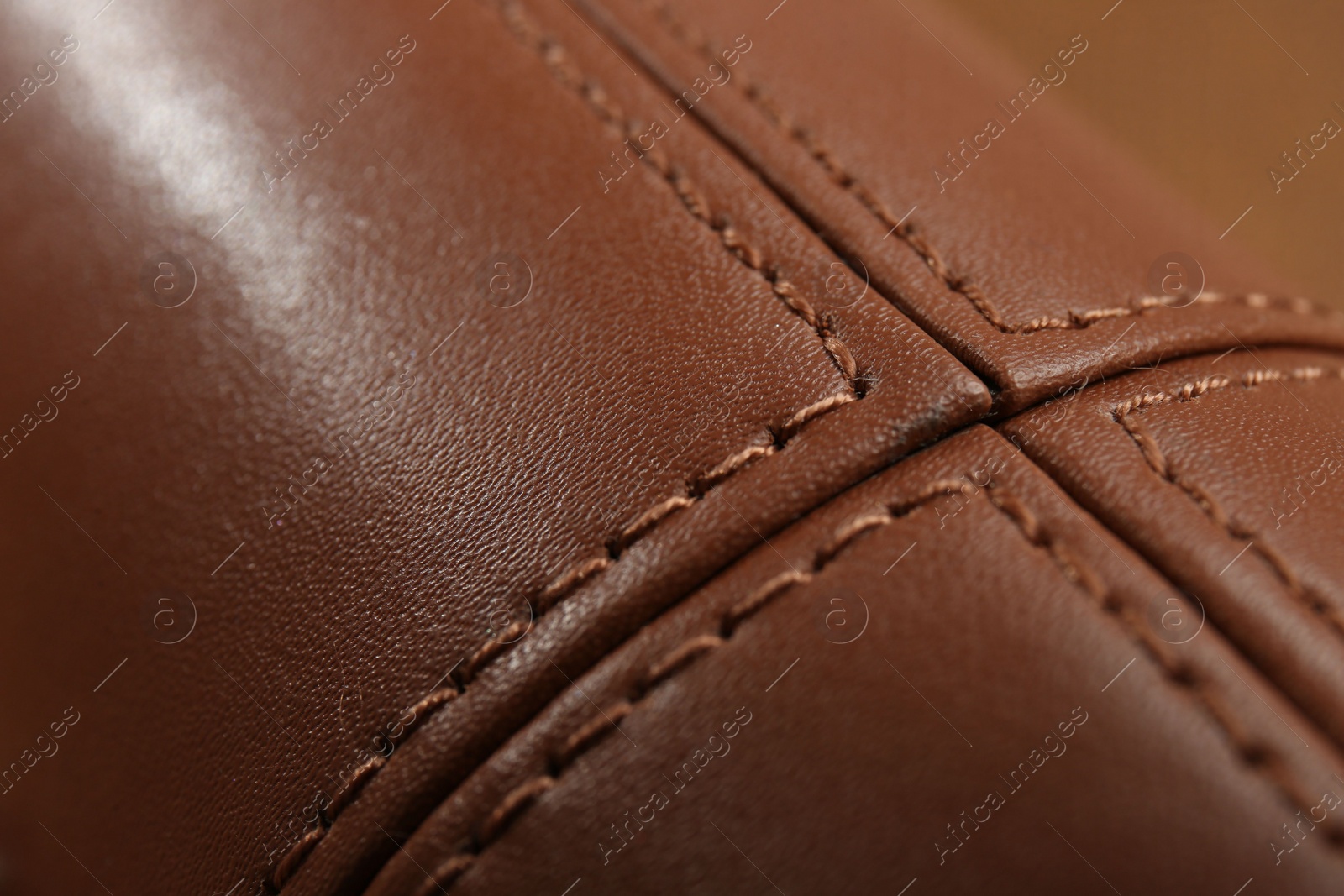 Photo of Texture of brown leather as background, closeup