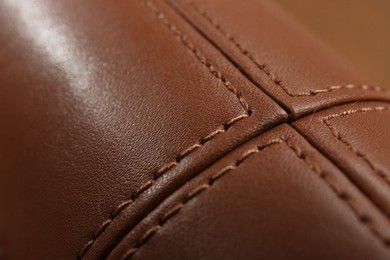 Photo of Texture of brown leather as background, closeup