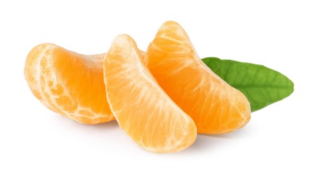Photo of Pieces of fresh ripe tangerine and green leaf isolated on white