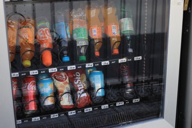 Split, Croatia - October 13, 2023: Vending machine with bottles of different drinks and snacks outdoors