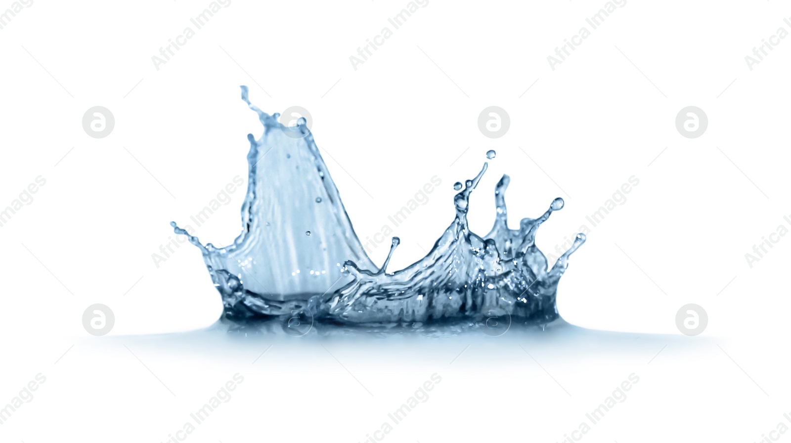 Photo of Splash of pure water on light background, closeup