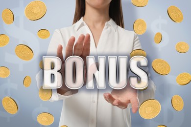 Woman holding word Bonus under falling coins on grey background with dollar signs, closeup