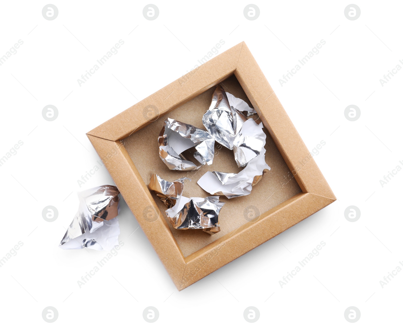 Photo of Empty box of chocolate candies with foil isolated on white, top view