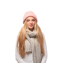 Photo of Portrait of beautiful young woman in stylish hat and sweater with scarf on white background. Winter atmosphere