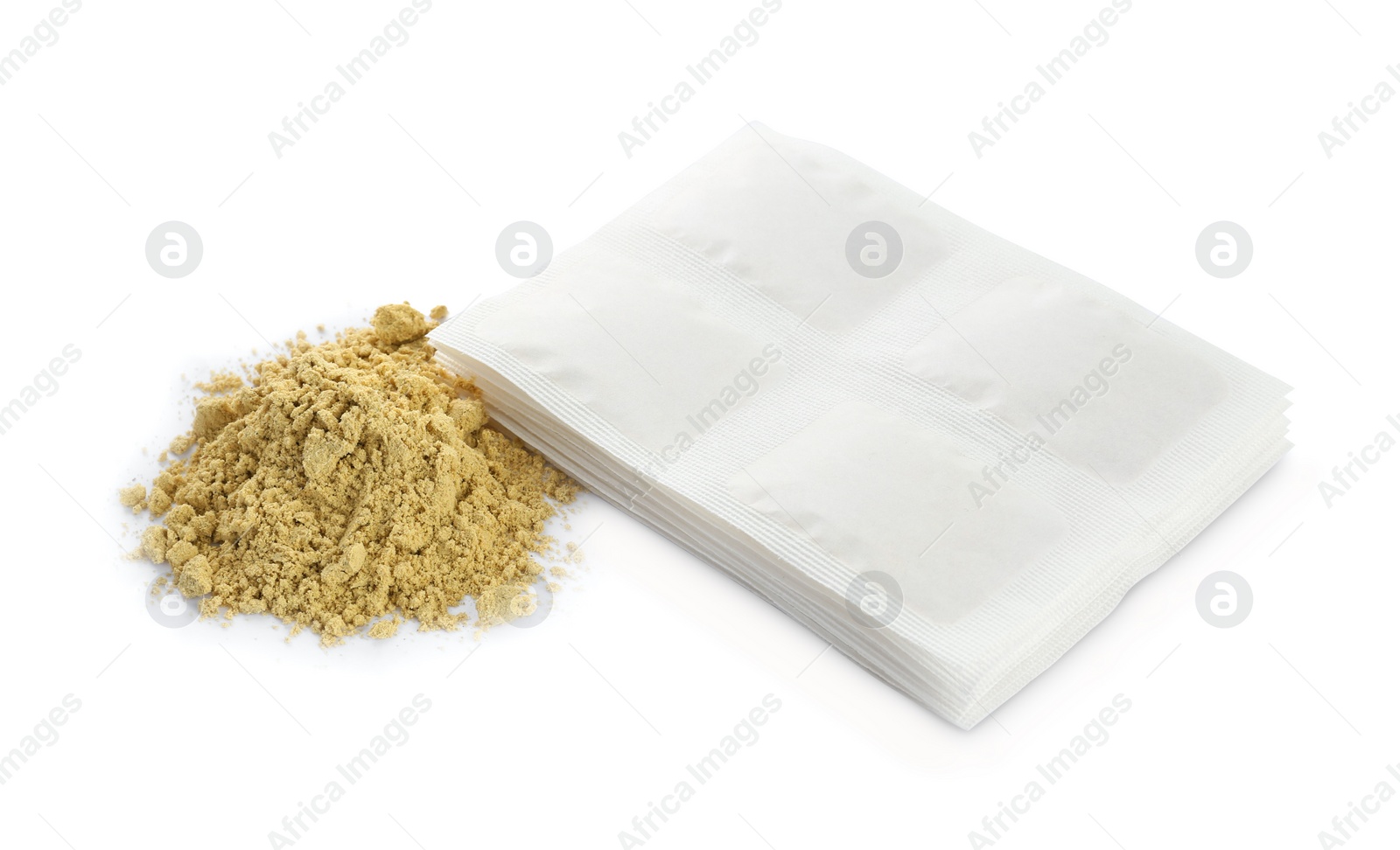 Photo of Mustard powder and plasters on white background