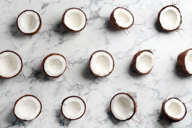 Coconut pattern on marble background, flat lay