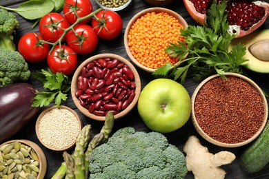 Photo of Different vegetables, seeds and fruits on table, flat lay. Healthy diet