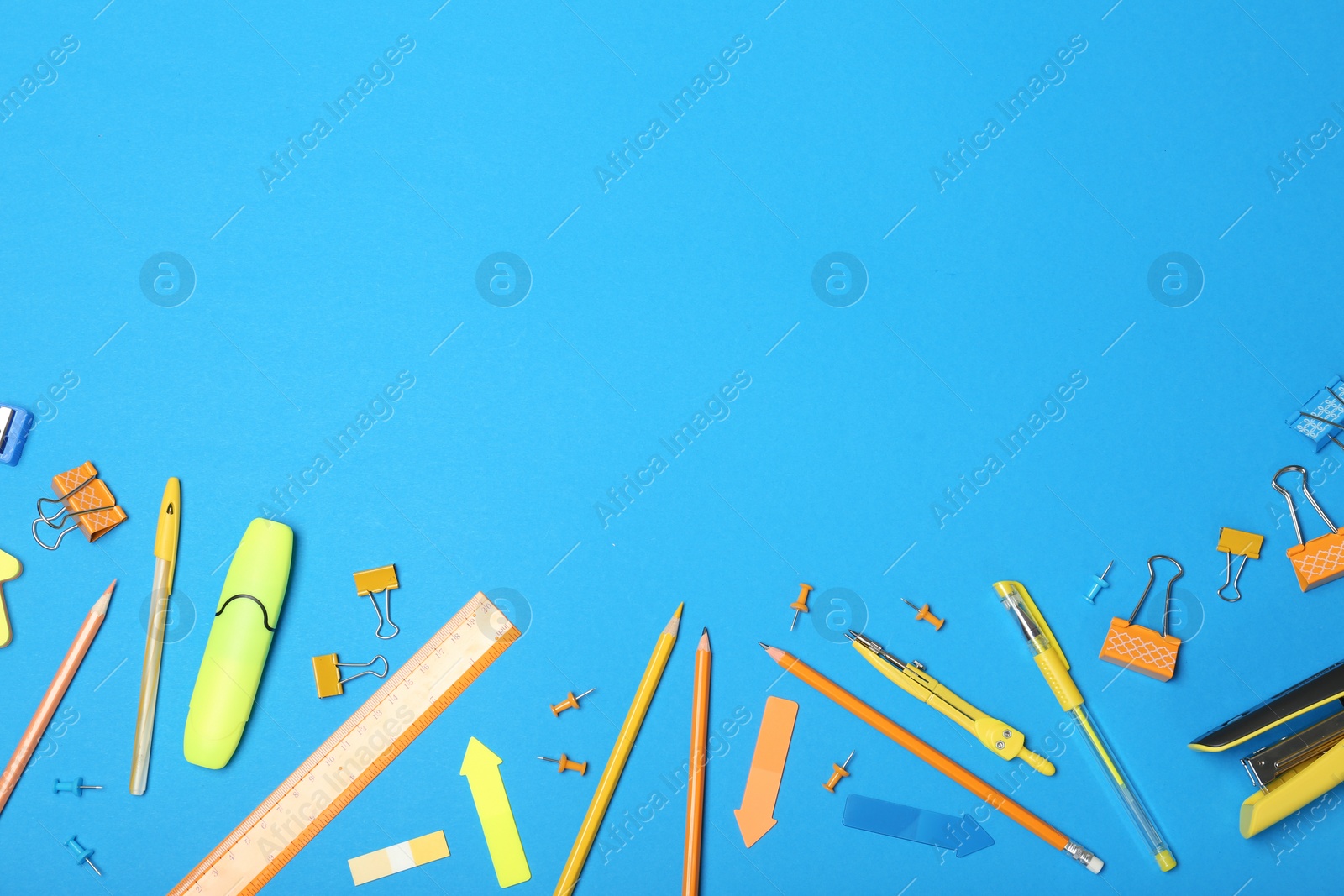 Photo of Flat lay composition with different school stationery on color background