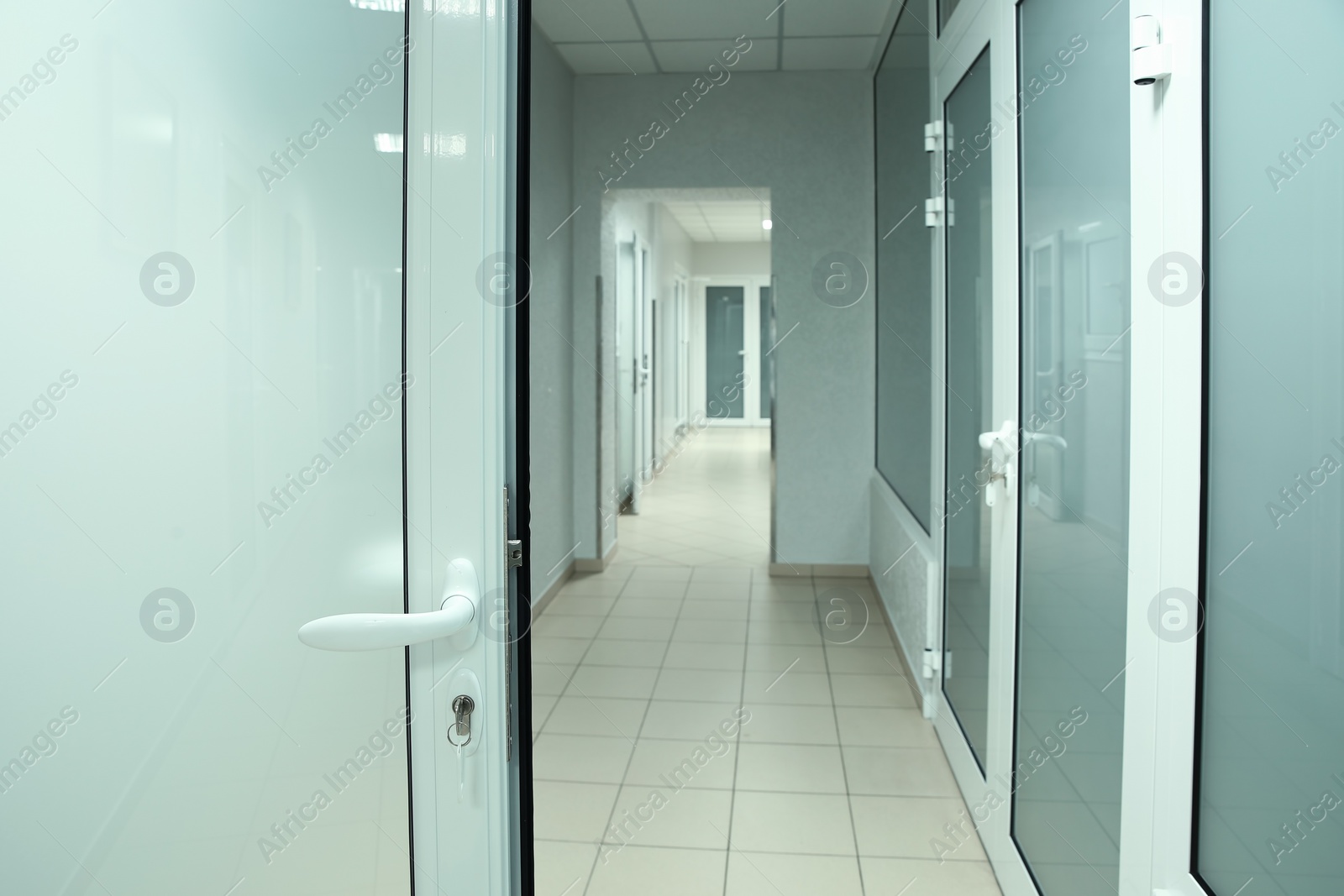 Photo of Light clean empty corridor in modern hospital