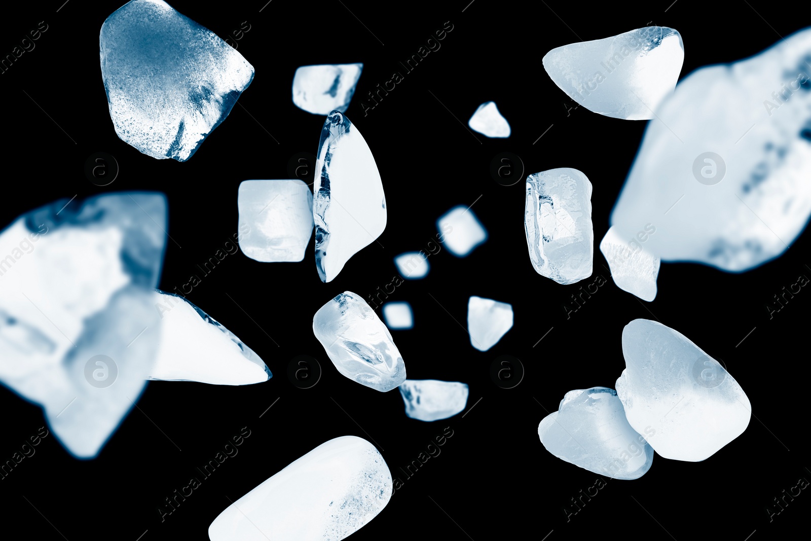 Image of Crushed ice in air on black background