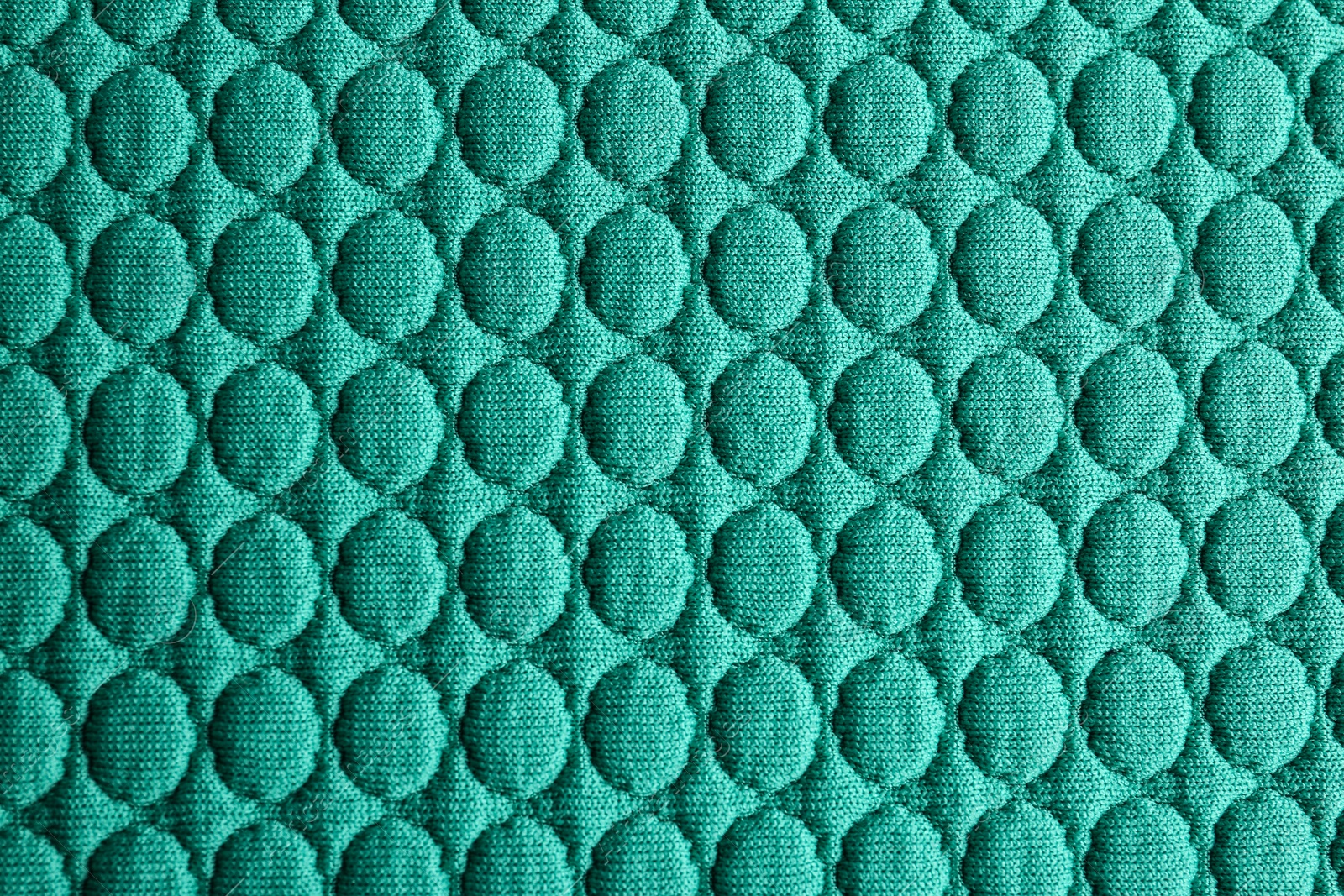 Photo of Textured turquoise fabric as background, closeup view