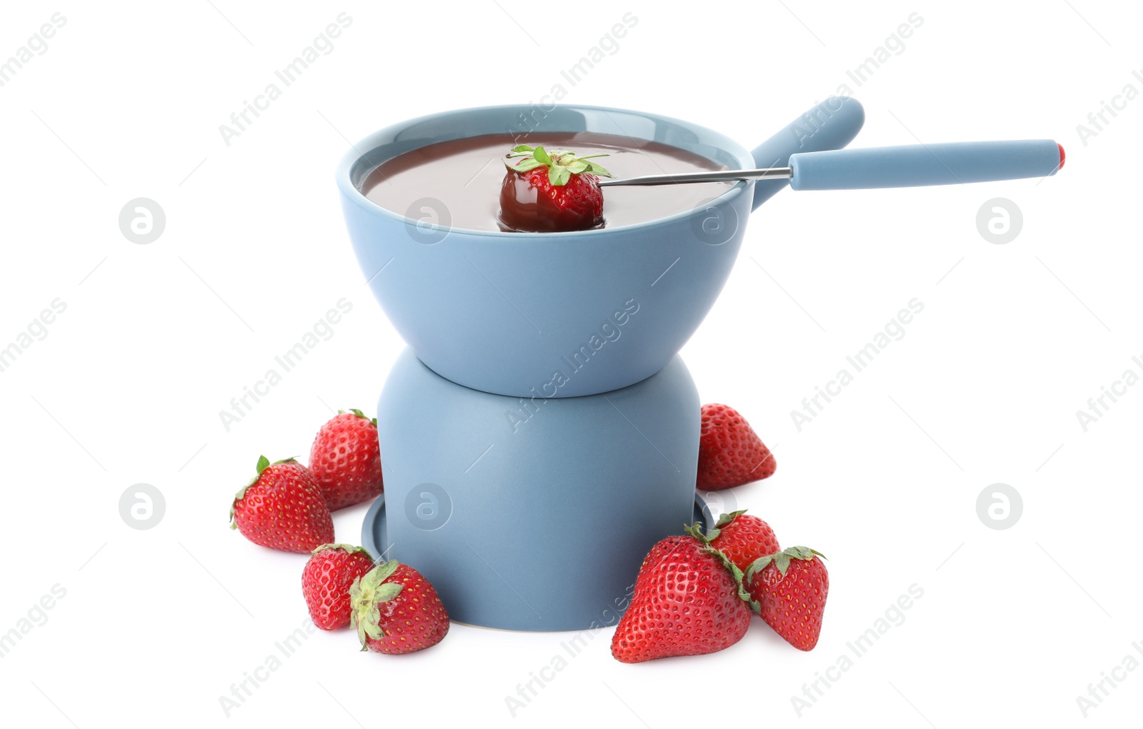 Photo of Fondue pot with chocolate, fork and fresh strawberries on white background