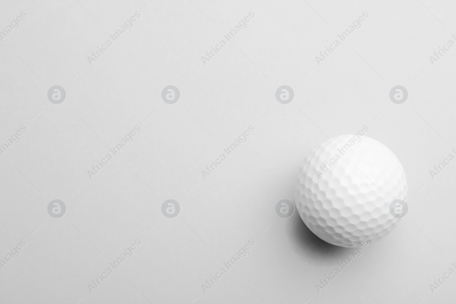 Photo of Golf ball on white background. Sport equipment