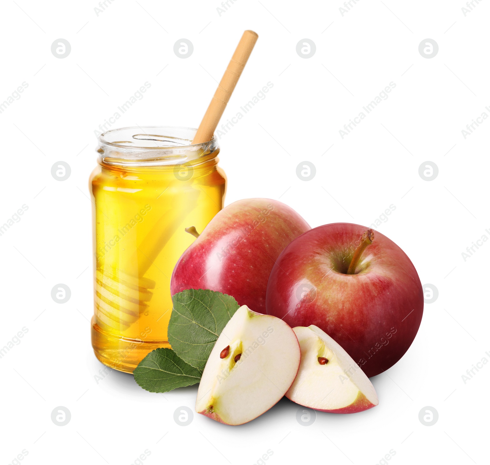 Image of Honey in glass jar and apples isolated on white