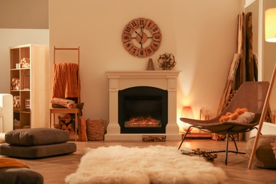 Photo of Beautiful view of cozy living room interior with fireplace