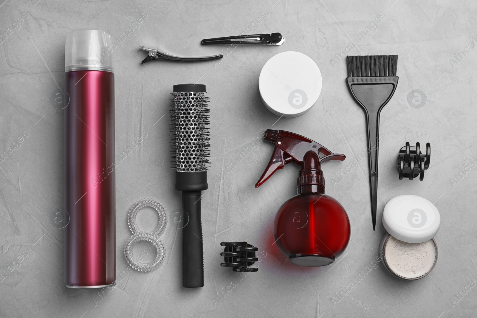 Photo of Professional hairdresser set on grey background