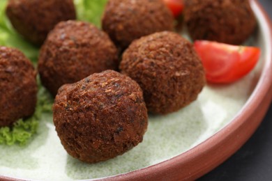 Delicious falafel balls on plate, closeup. Vegan meat products