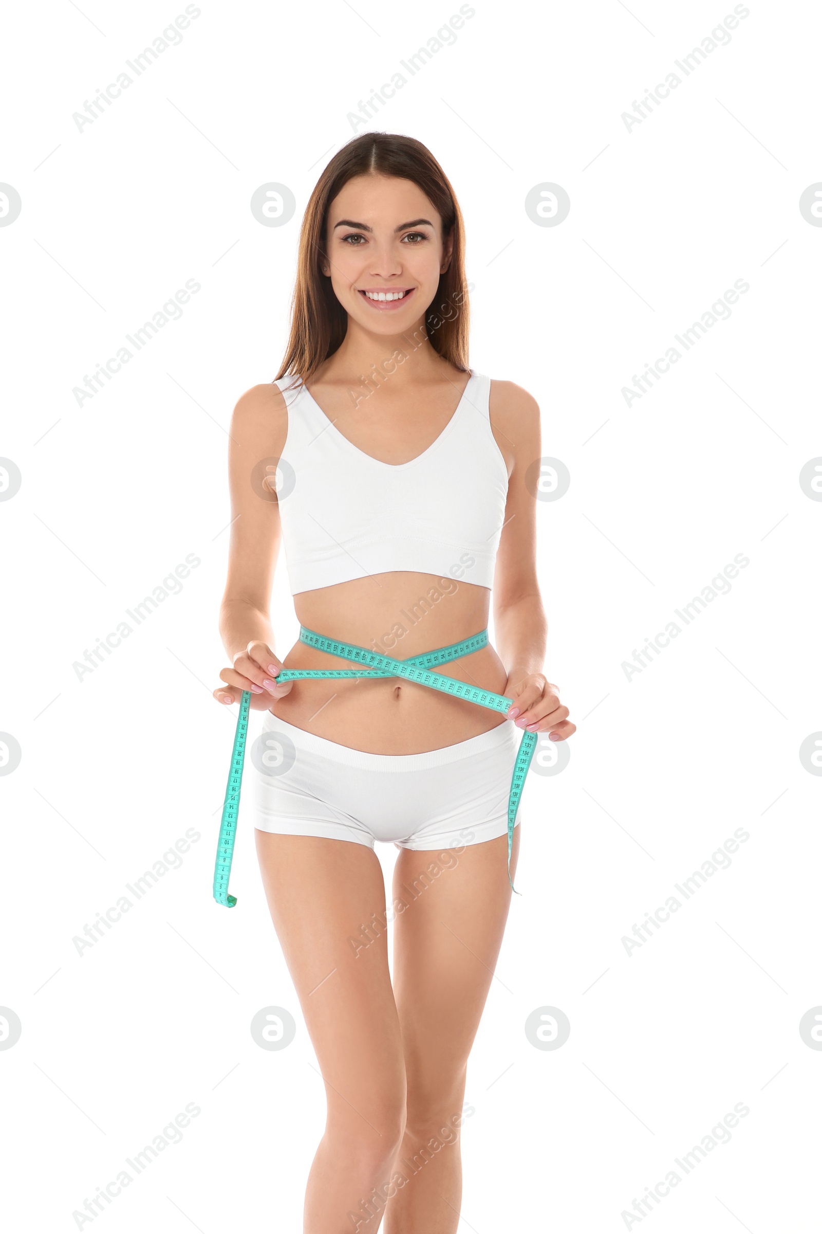 Photo of Slim woman measuring her waist on white background. Weight loss