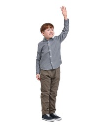 Smiling little boy waving hand on white background