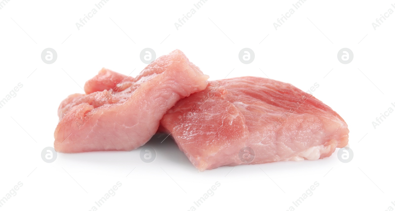 Photo of Pieces of raw meat isolated on white