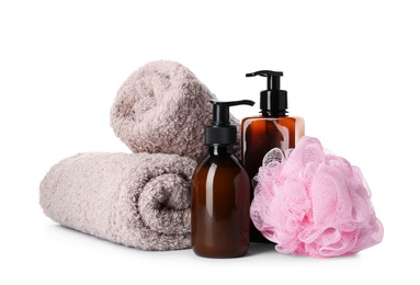 Photo of Personal hygiene products, shower puff and towels on white background