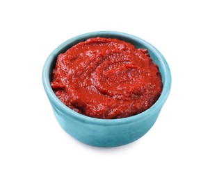 Photo of Bowl of tasty tomato paste isolated on white