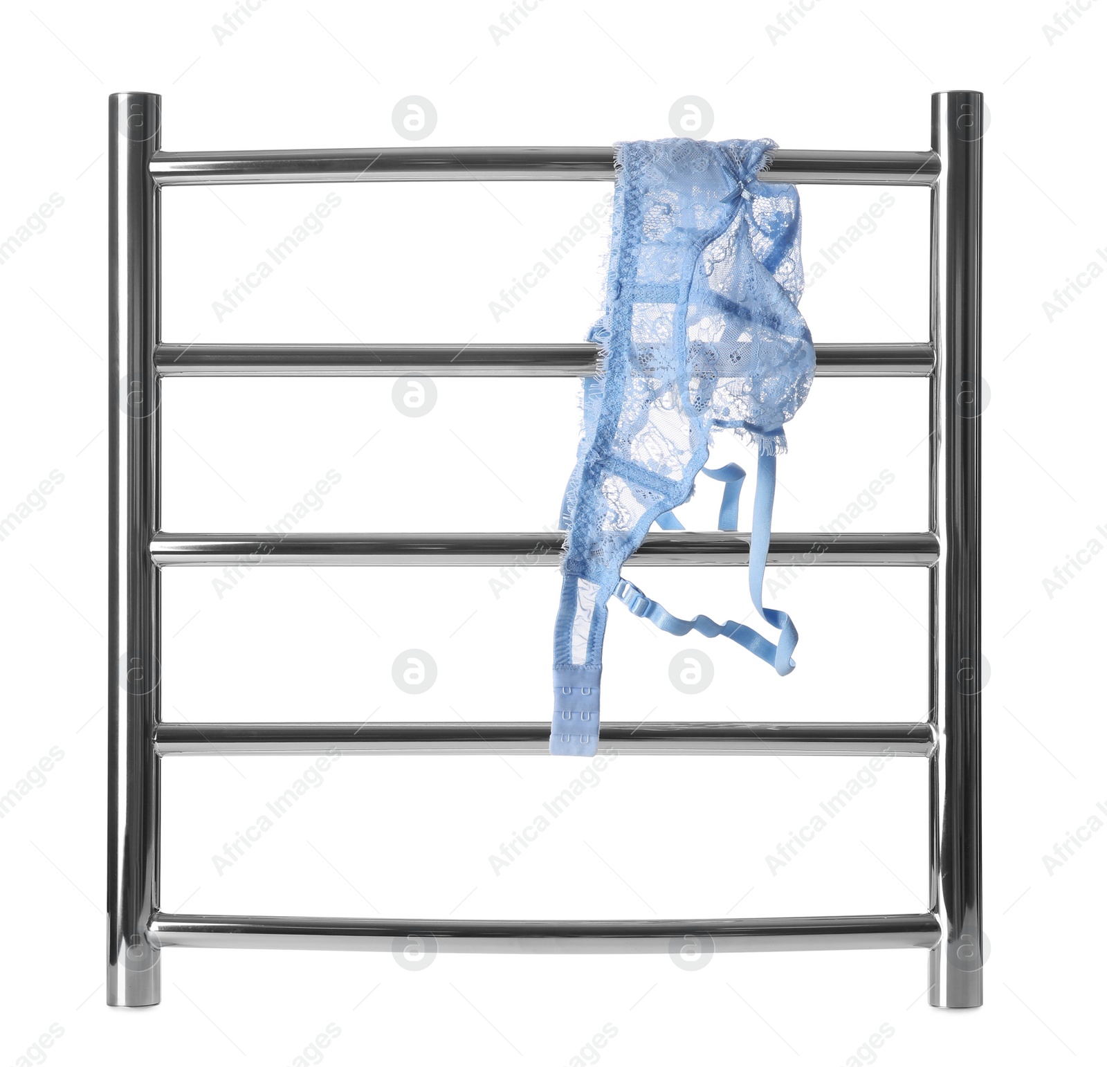 Photo of Modern heated towel rail with underwear isolated on white