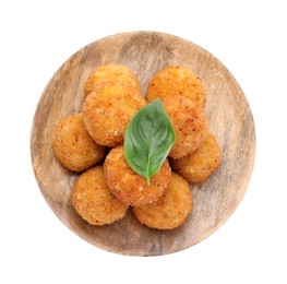 Photo of Wooden tray with delicious fried tofu balls and basil on white background, top view