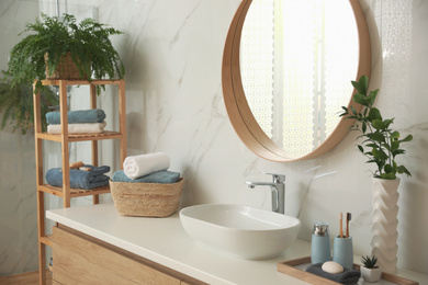 Stylish bathroom interior with countertop and mirror. Design idea