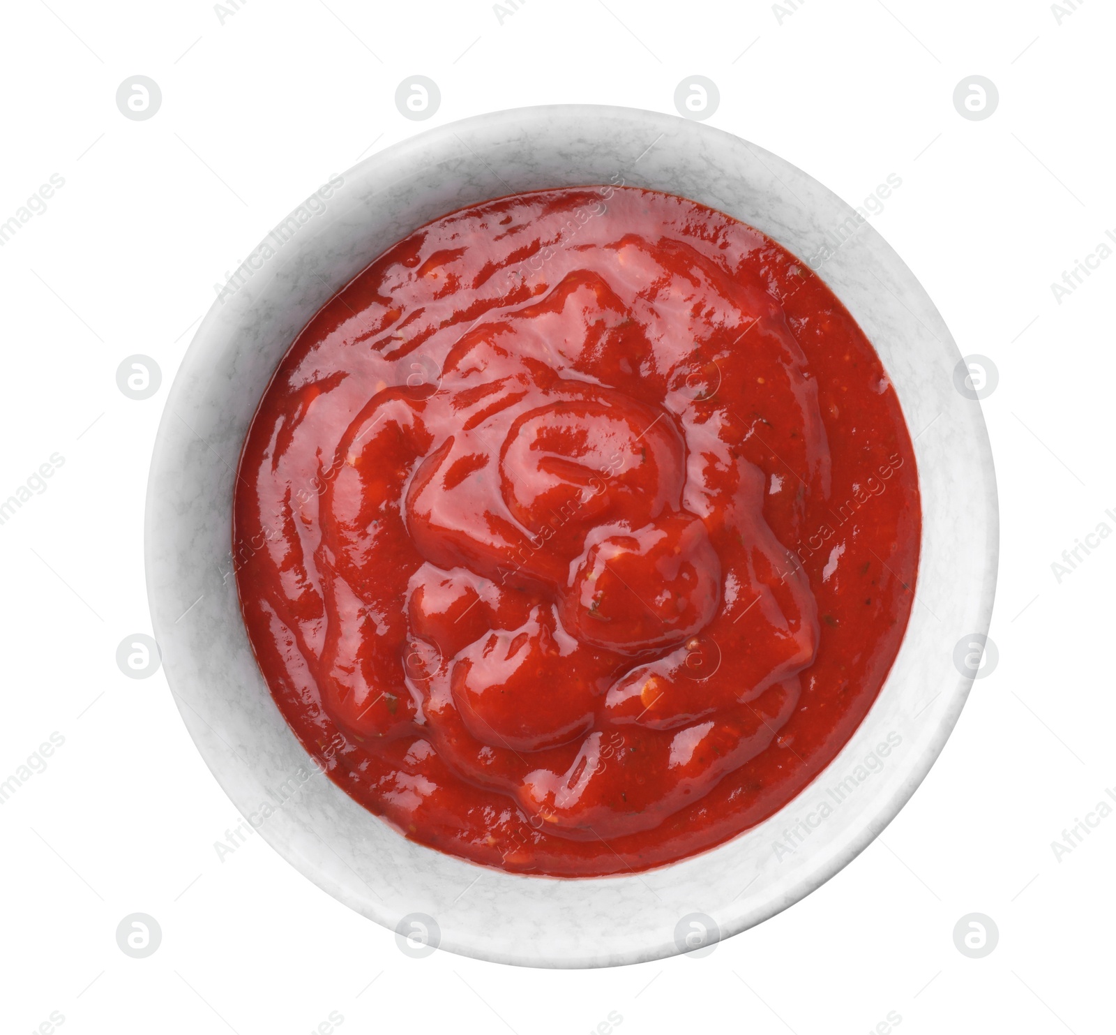 Photo of Bowl with red sauce isolated on white, top view