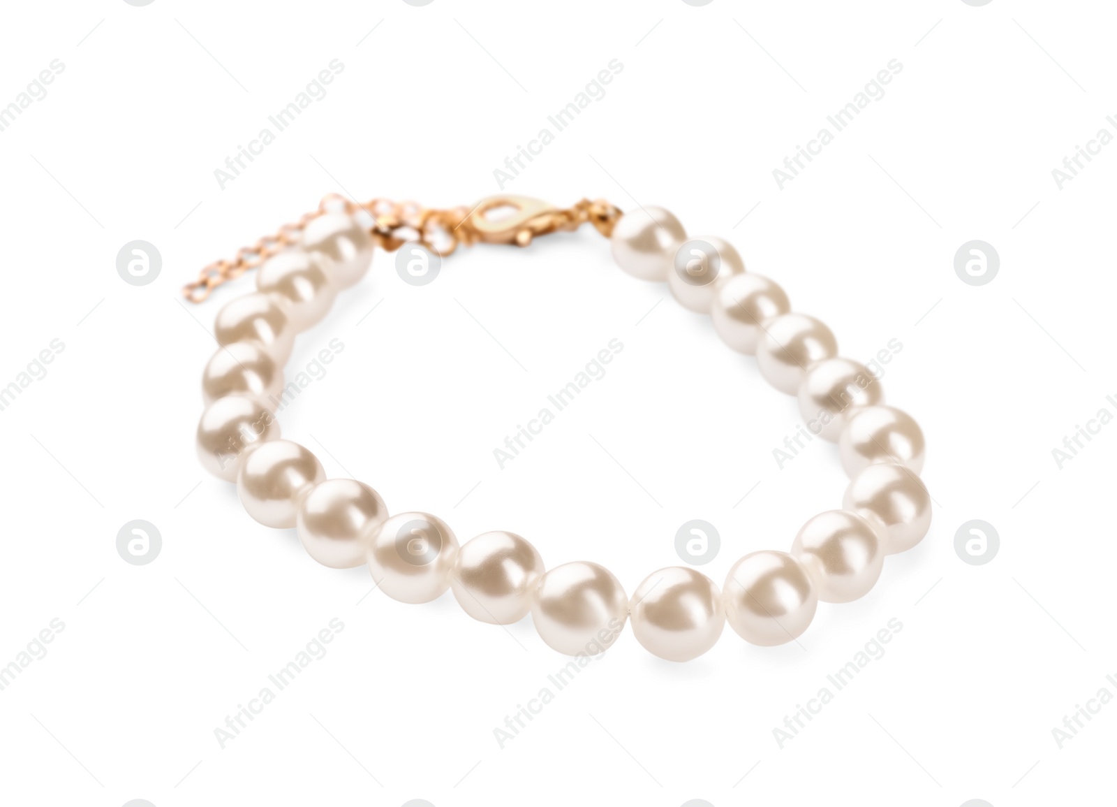 Photo of Elegant bracelet with pearls isolated on white