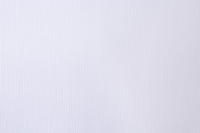 Photo of Texture of white paper sheet as background, top view