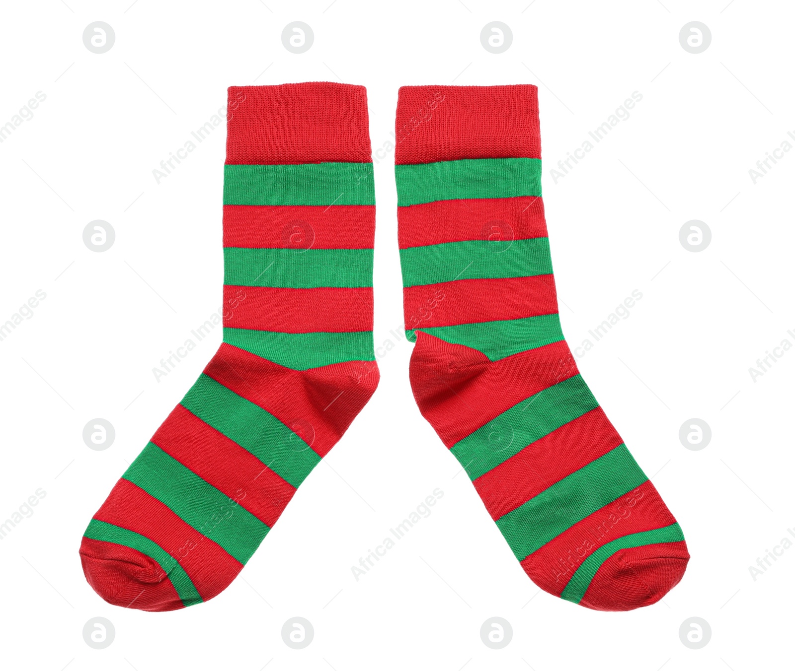 Photo of Striped socks on white background, top view