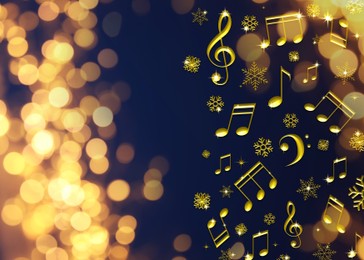 Music notes and snowflakes on blue background, space for text. Bokeh effect