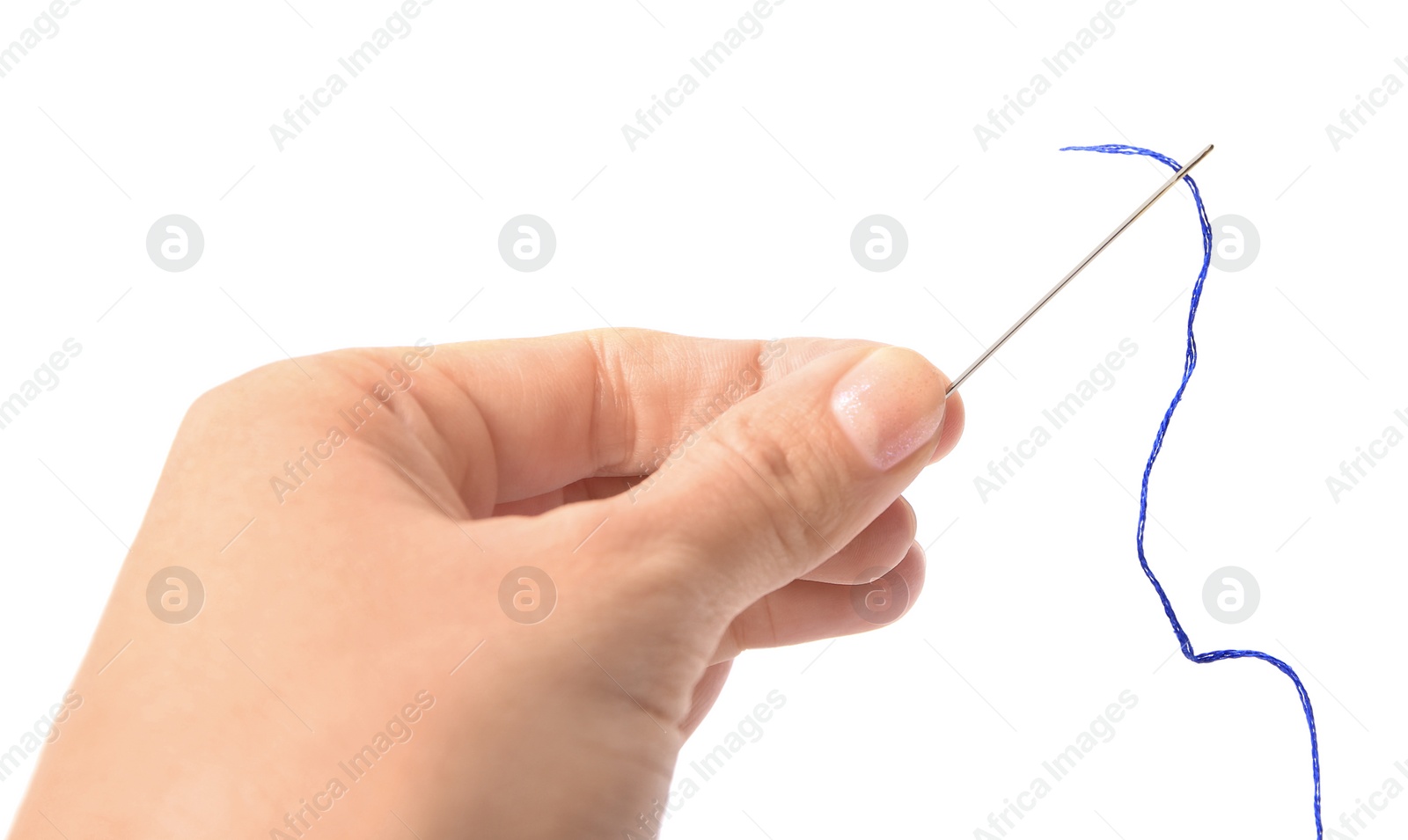 Photo of Woman holding sewing needle with thread on white background, closeup