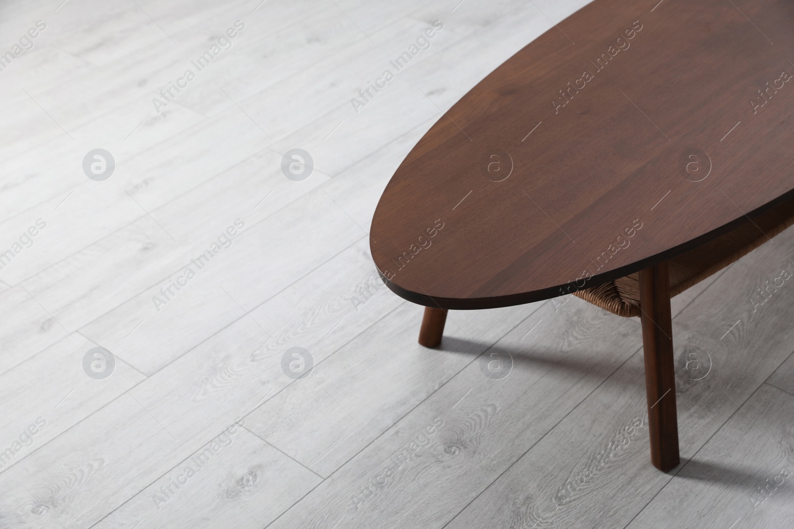 Photo of Empty wooden table indoors, space for text. Stylish furniture