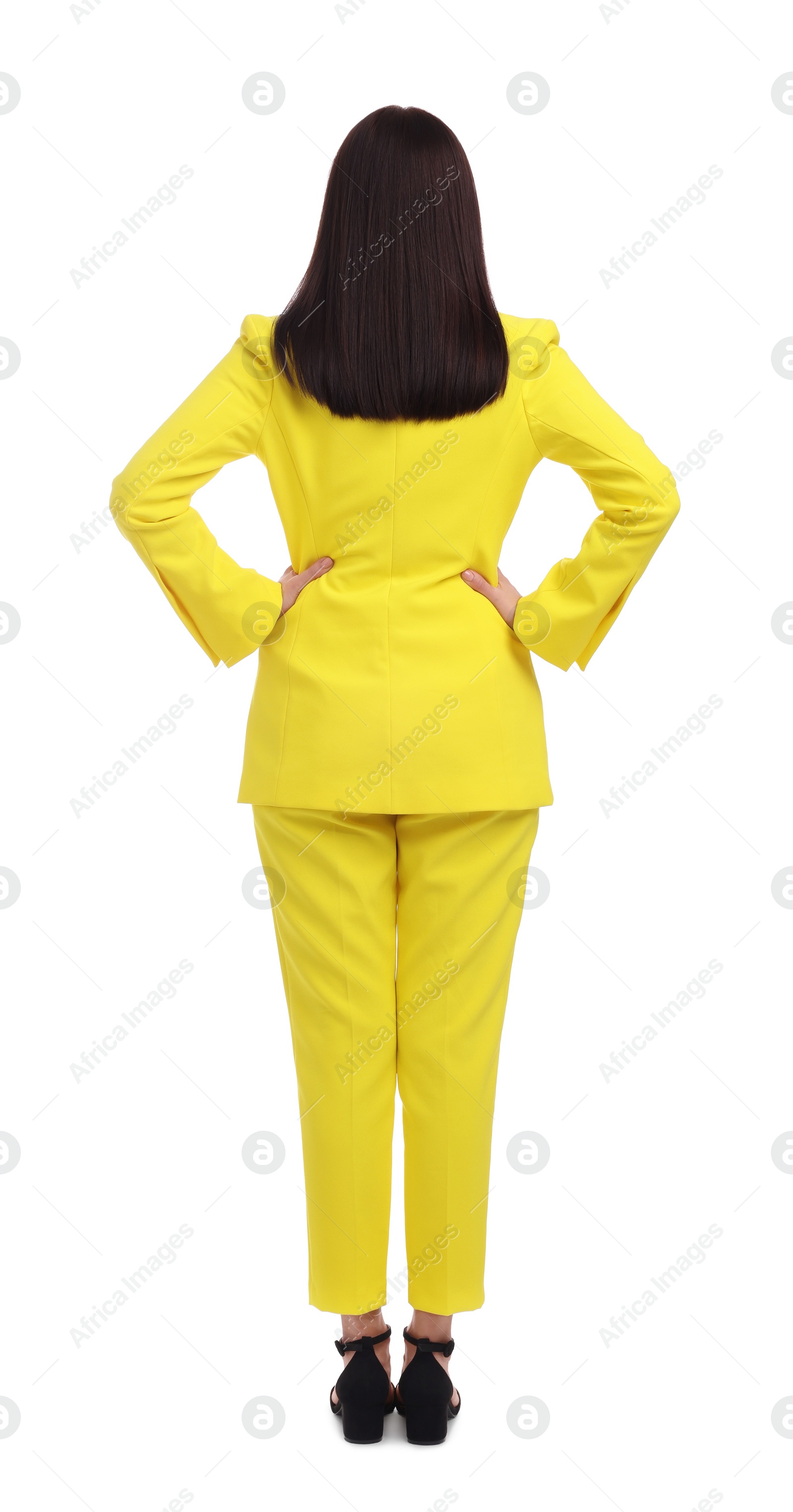 Photo of Businesswoman in yellow suit on white background, back view