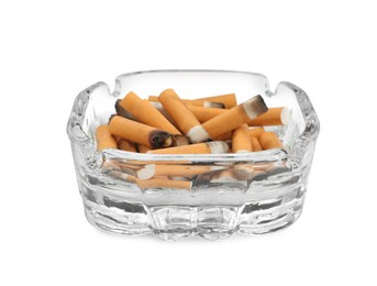 Glass ashtray with cigarette stubs isolated on white