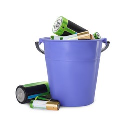 Image of Used batteries and bucket on white background