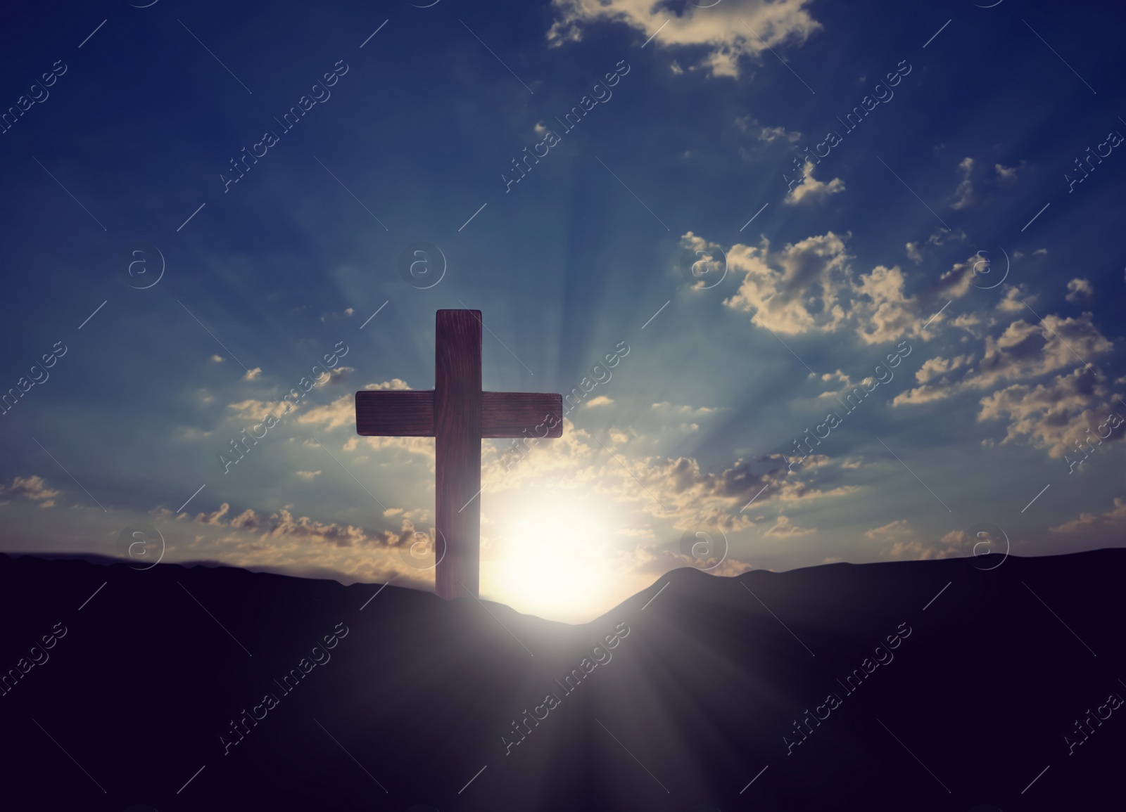 Image of Christian cross on hill outdoors at sunrise. Resurrection of Jesus