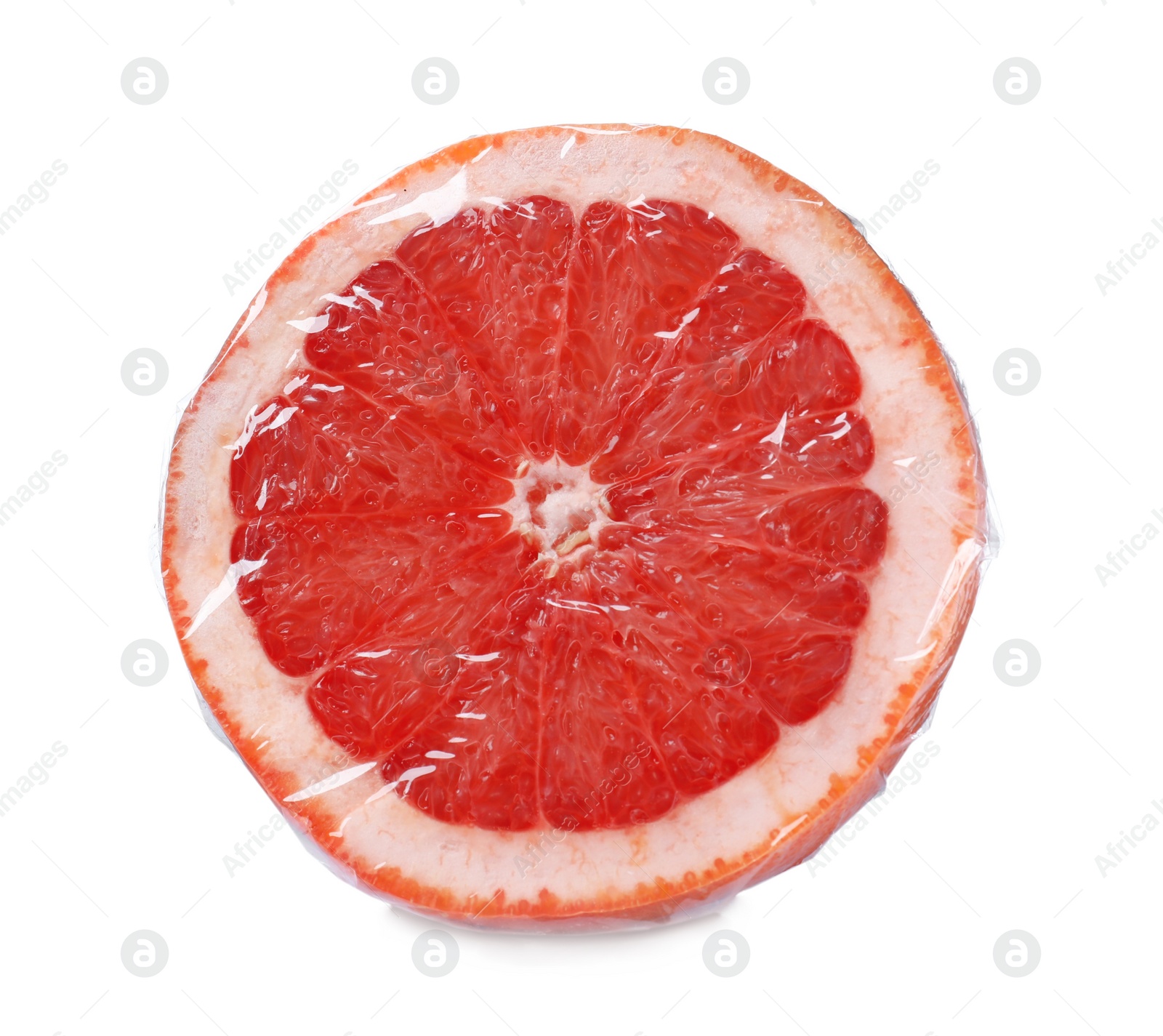 Photo of Half of fresh grapefruit wrapped with transparent plastic stretch film isolated on white