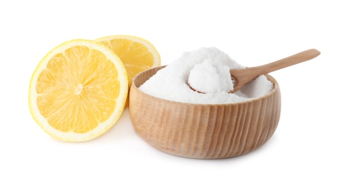 Photo of Baking soda and cut lemon on white background