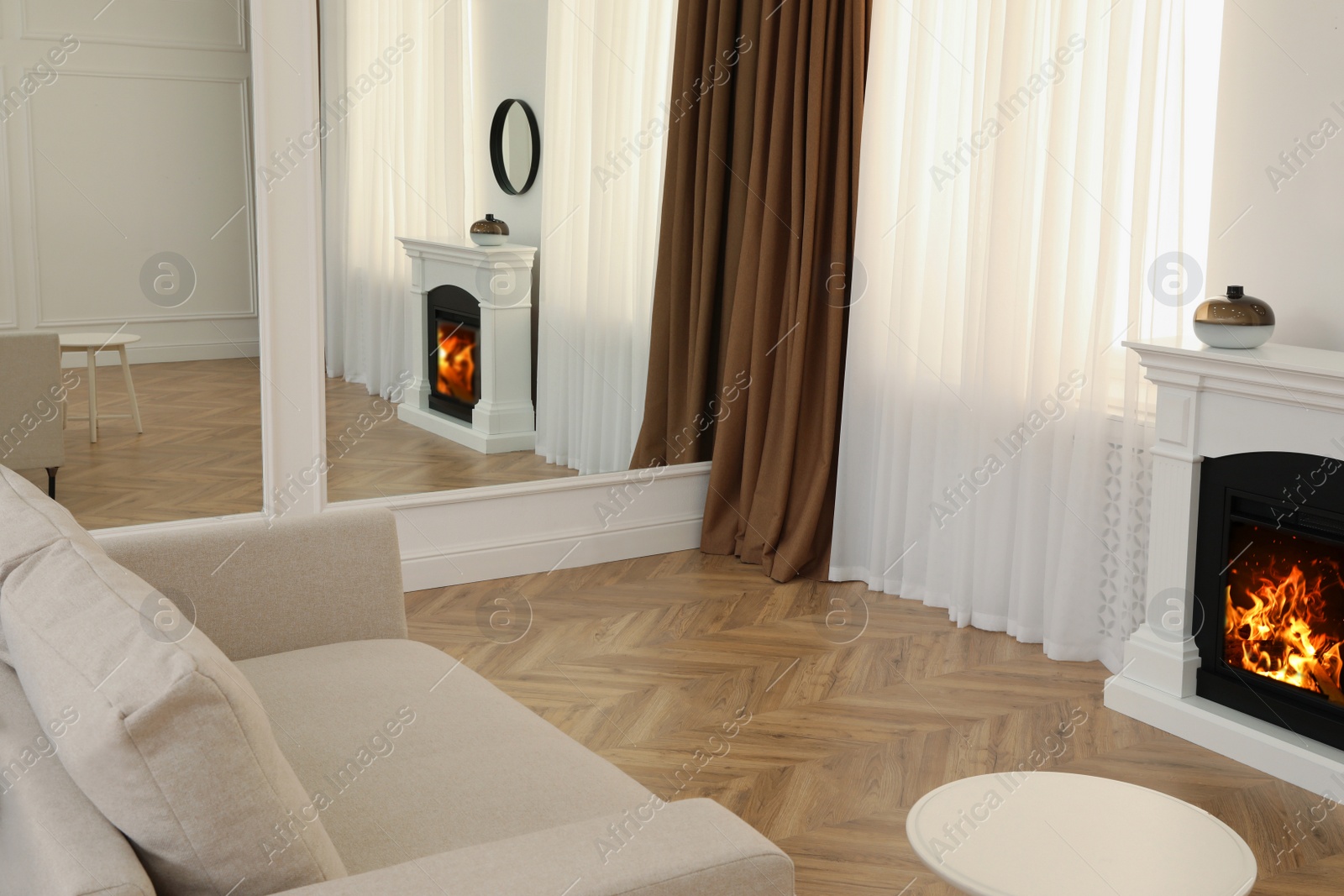 Photo of Modern living room with parquet flooring and fireplace