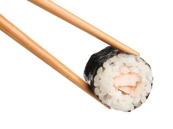 Chopsticks with tasty fresh sushi roll isolated on white