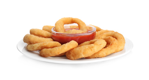 Photo of Delicious golden onion rings with ketchup isolated on white