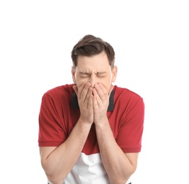 Man suffering from cough isolated on white