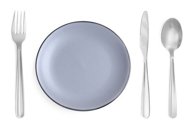 Image of Empty grey plate with fork, knife and spoon on white background, top view